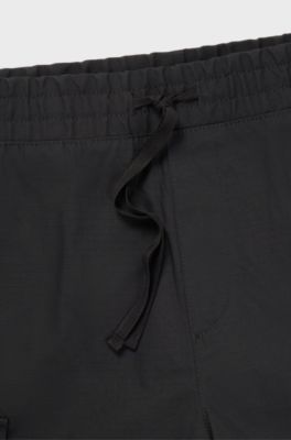 Structured-cotton shorts with red logo label, Black