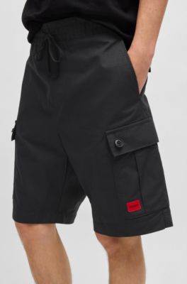 Shorts aus strukturierter Baumwolle mit rotem Logo-Label, Schwarz