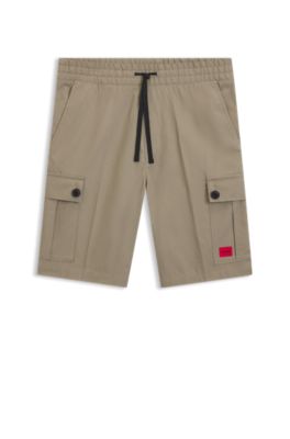 Structured-cotton shorts with red logo label, Brown