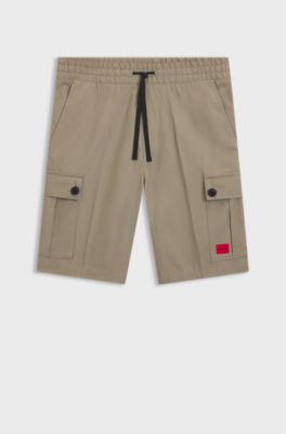 Structured-cotton shorts with red logo label, Brown