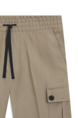 Structured-cotton shorts with red logo label, Brown