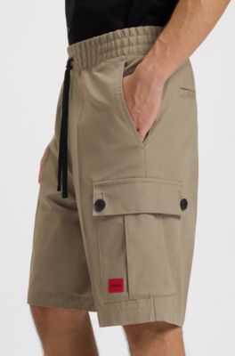 Structured-cotton shorts with red logo label, Brown