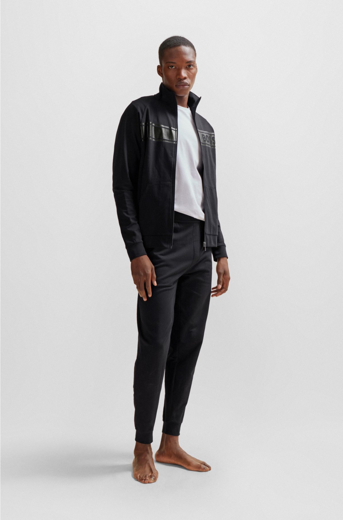 Cuffed tracksuit bottoms in French terry with logo print, Black