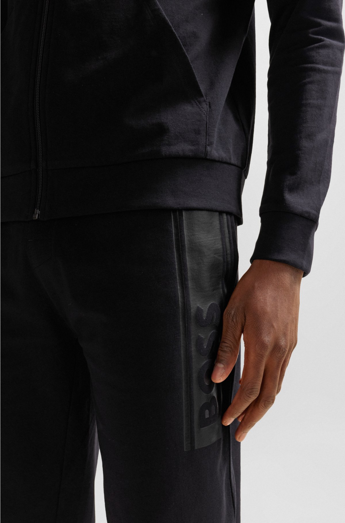 Cuffed tracksuit bottoms in French terry with logo print, Black
