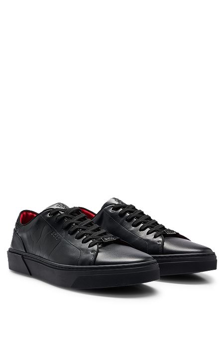 Lace-up trainers in leather with special embossed artwork, Black