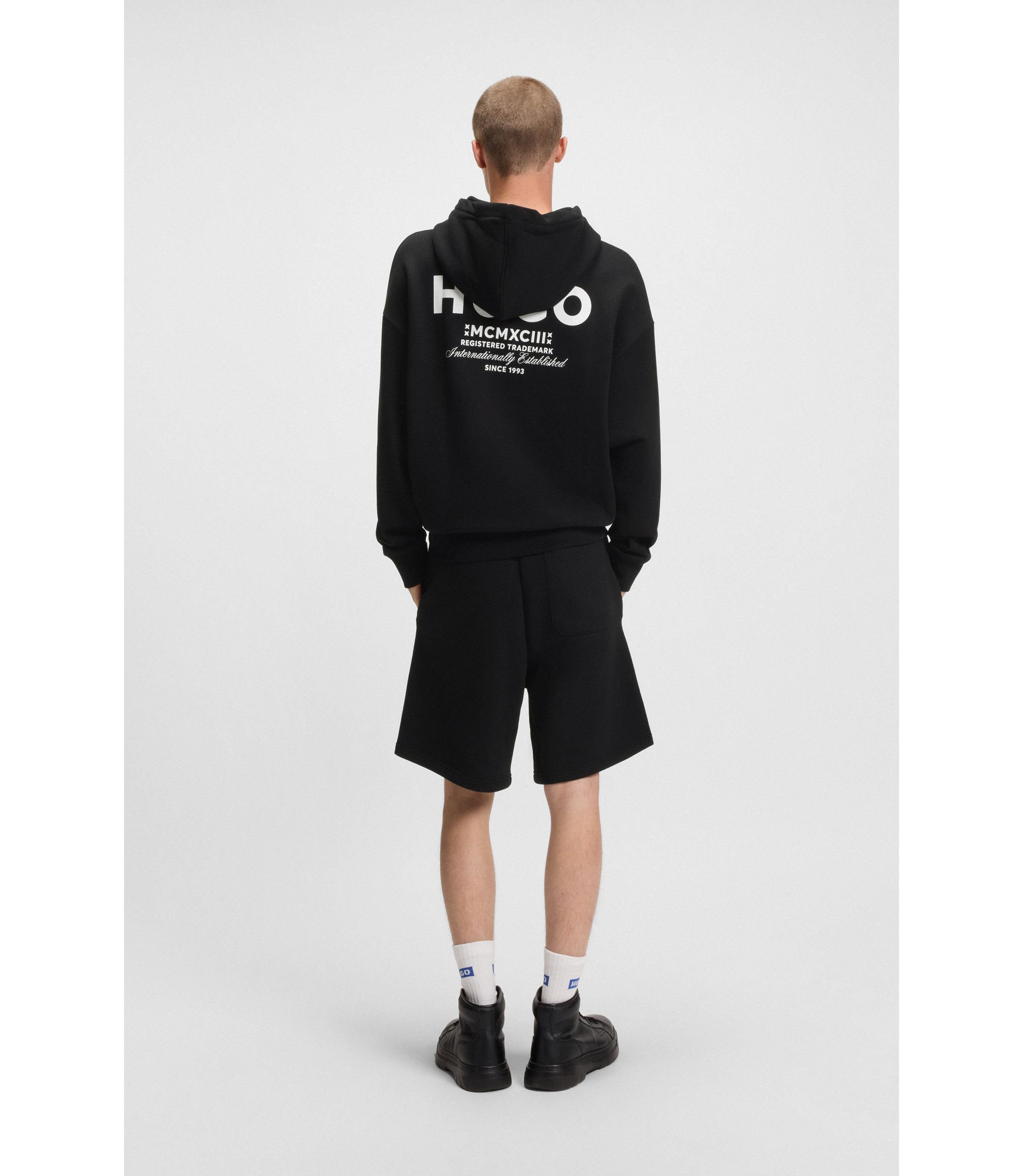 Loose-Fit Hoodie aus Baumwoll-Terry mit Logo-Details