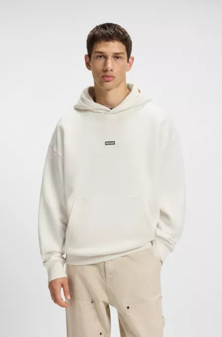 Cotton-terry loose-fit hoodie with logo details