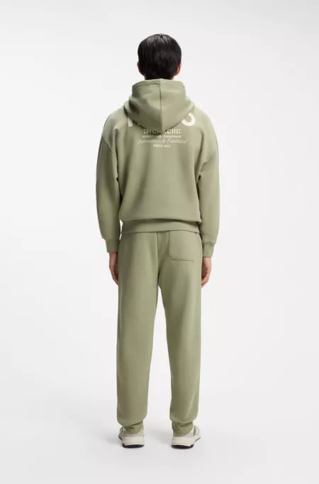 Cotton-terry loose-fit hoodie with logo details