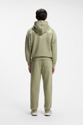 Cotton-terry loose-fit hoodie with logo details
