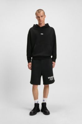 Loose-fit shorts in cotton terry with logo print, Black