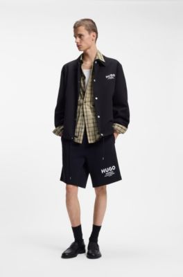 Loose-fit shorts in cotton terry with logo print, Black