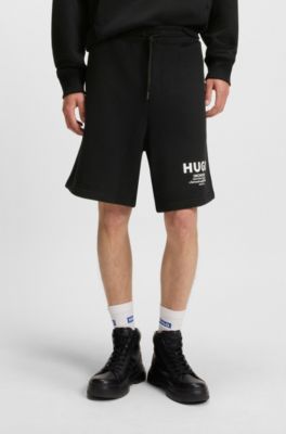 Loose-fit shorts in cotton terry with logo print, Black