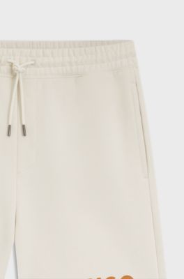 Loose-fit shorts in cotton terry with logo print, Natural