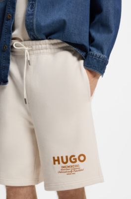 Loose-fit shorts in cotton terry with logo print, Natural