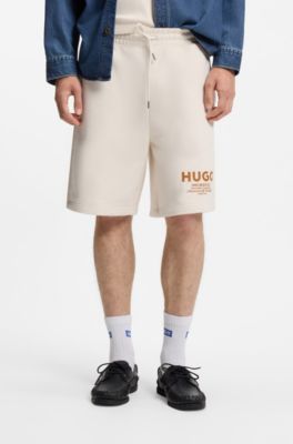 Loose-fit shorts in cotton terry with logo print, Natural