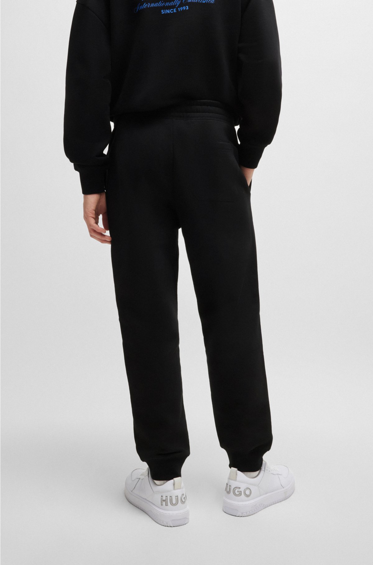 Cotton-terry tracksuit bottoms with logo print, Black