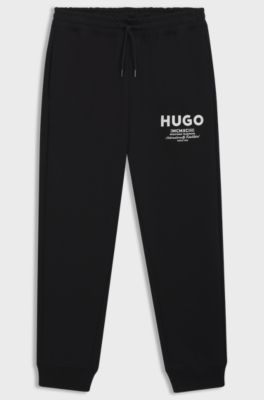 Cotton-terry tracksuit bottoms with logo print, Black