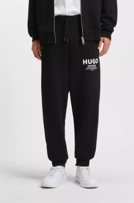 Cotton-terry tracksuit bottoms with logo print