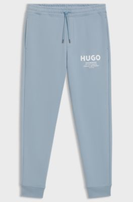 Cotton-terry tracksuit bottoms with logo print, Light Blue