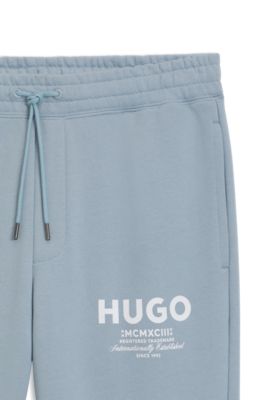 Cotton-terry tracksuit bottoms with logo print, Light Blue