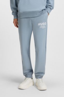 Cotton-terry tracksuit bottoms with logo print, Light Blue