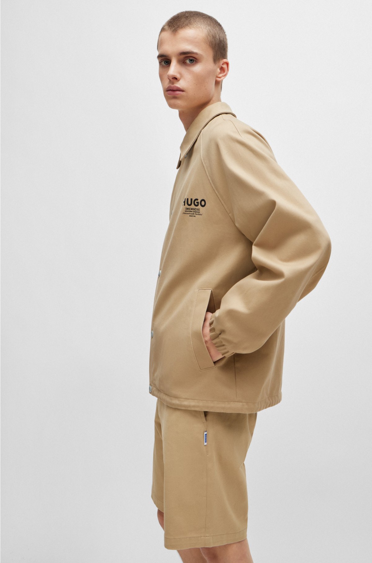 Slim-fit coach jacket with logo prints, Beige
