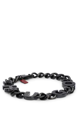 Chain cuff with inserted logo letters, Black
