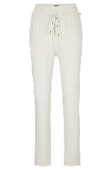 Straight-leg tracksuit bottoms in stretch fabric, White
