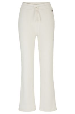 Elderly Woman with Wide Hips 180cm in White Trousers