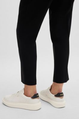 Lace-up trainers in leather with logo details, White