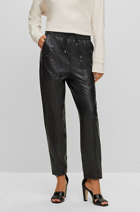 Relaxed-fit trousers in coated fabric with drawstring waist, Black
