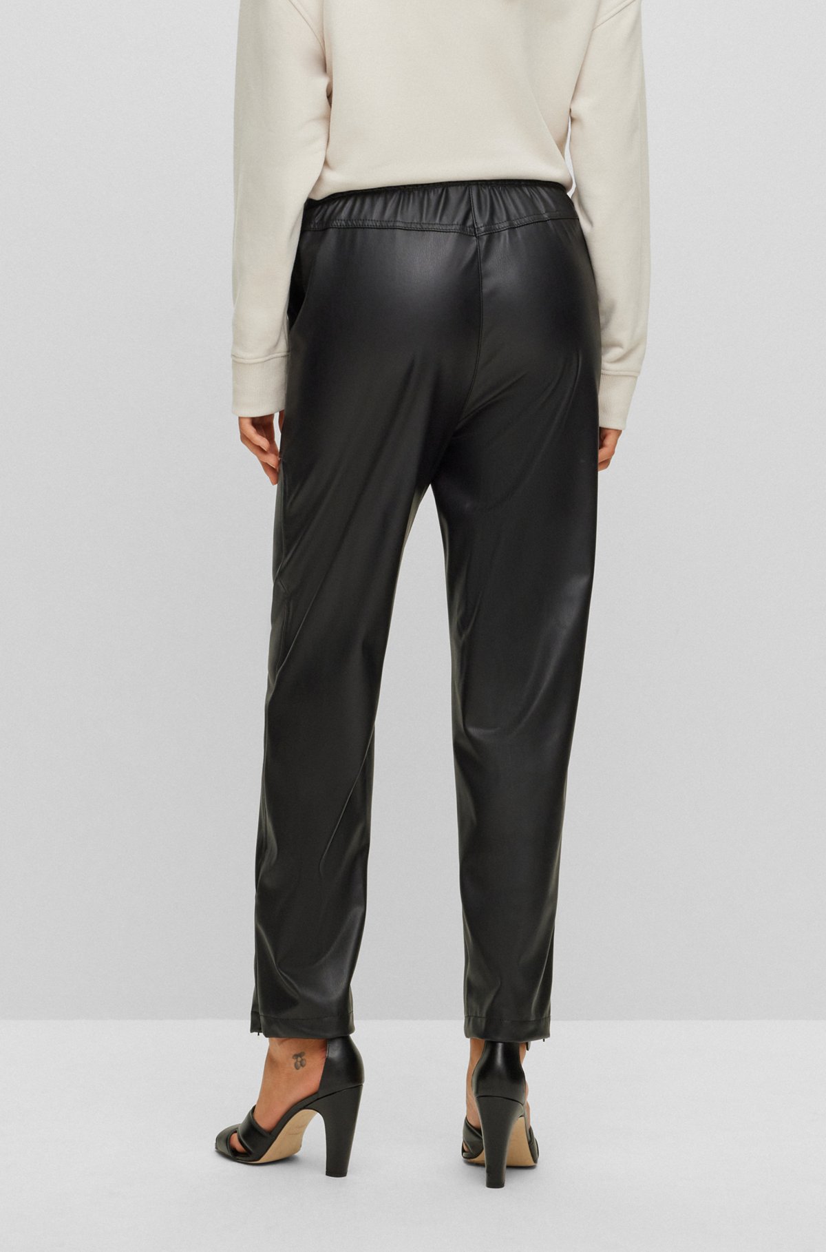 Relaxed-fit trousers in coated fabric with drawstring waist, Black