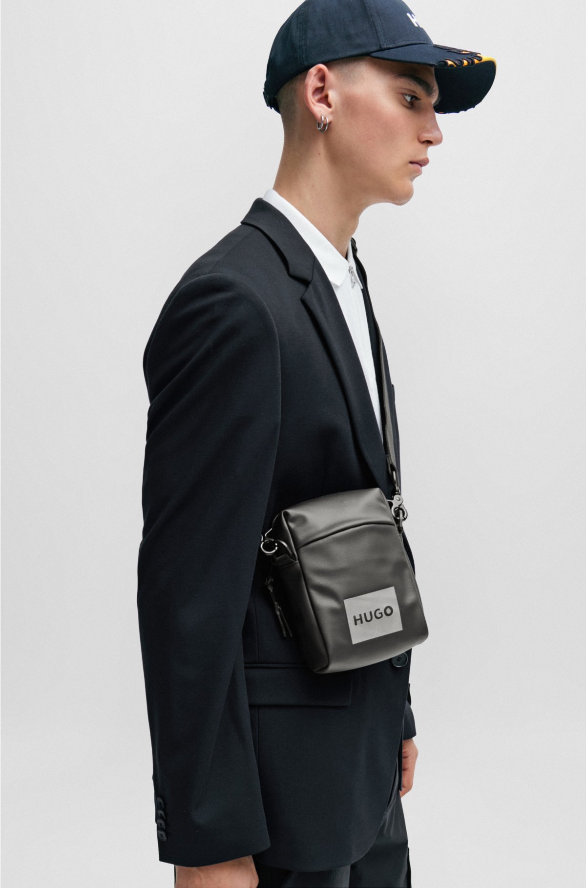 Reporter bag with decorative reflective logo print, Black