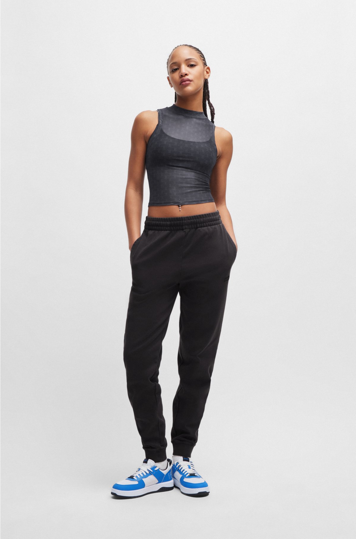 Slim-fit sleeveless top in logo mesh, Black Patterned
