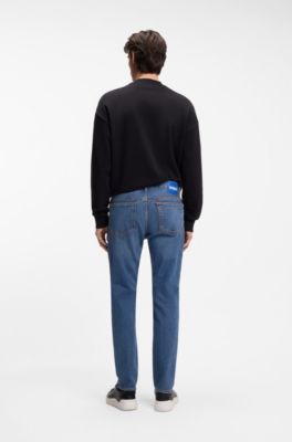 Jeans slim fit de denim el&aacute;stico en azul medio, Azul