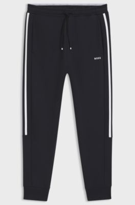Stretch-cotton tracksuit bottoms with stripe insert, Dark Blue
