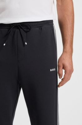 Tracksuit-byxor i stretchig bomull med rand, M&ouml;rkbl&aring;