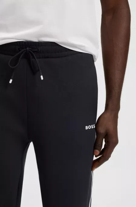 Stretch-cotton tracksuit bottoms with stripe insert