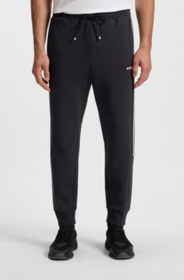 Bas de surv&ecirc;tement en coton stretch avec empi&egrave;cement &agrave; rayures, Bleu fonc&eacute;