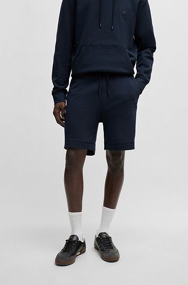 Shorts regular fit en felpa de algodón con insignia de logo, Azul oscuro