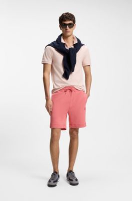 Bermuda in terry di cotone con patch con logo, Rosso chiaro