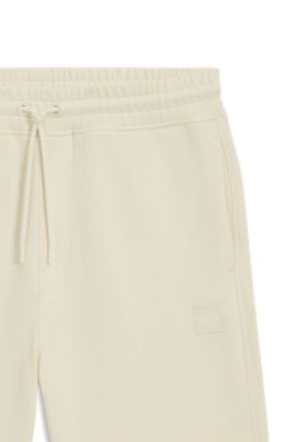 Cotton-terry shorts with logo patch, Light Yellow