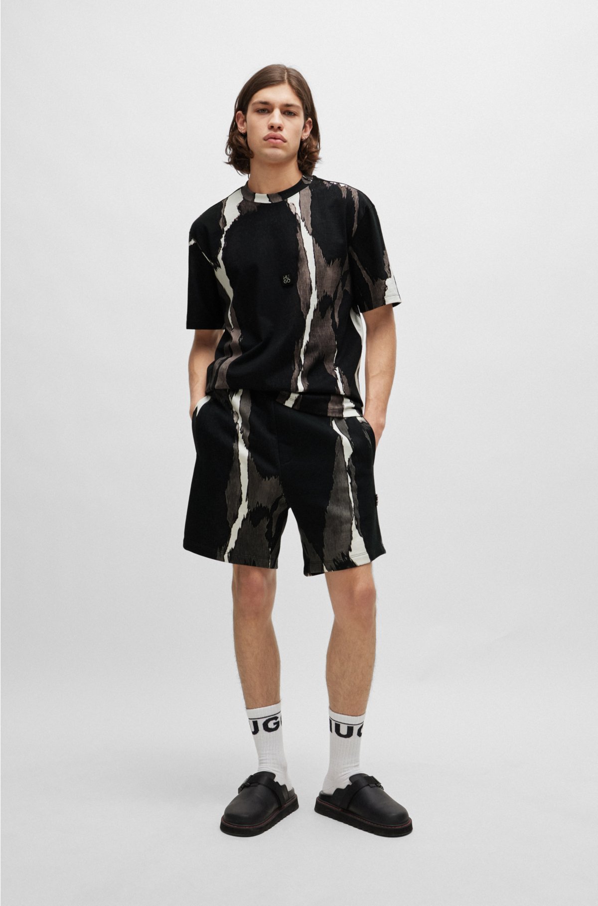Cotton-jersey T-shirt with seasonal print and stacked logo , Black
