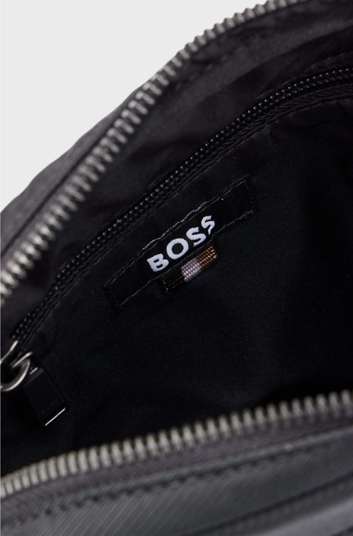 Crossbody bag with contrast logo and signature-stripe strap, Black