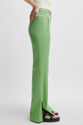 Slim-fit trousers with flared leg in stretch material, Green