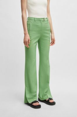 Slim-fit trousers with flared leg in stretch material, Green