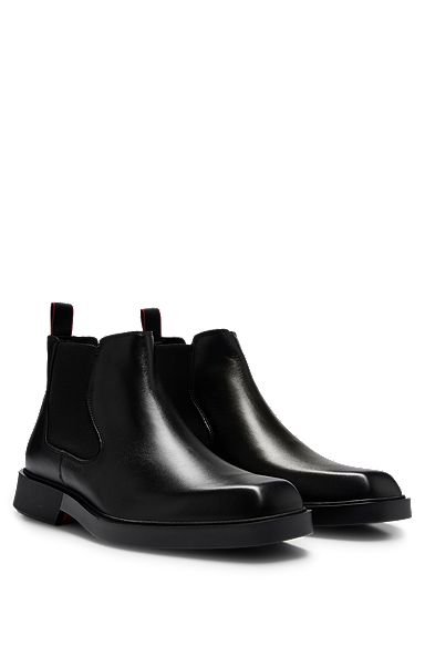 Leather Chelsea boots with signature pull loop, Black