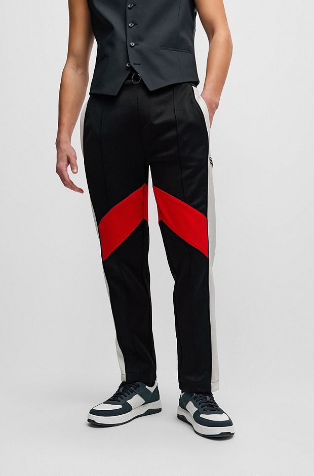 Relaxed-fit tracksuit bottoms with colour-blocking, Black