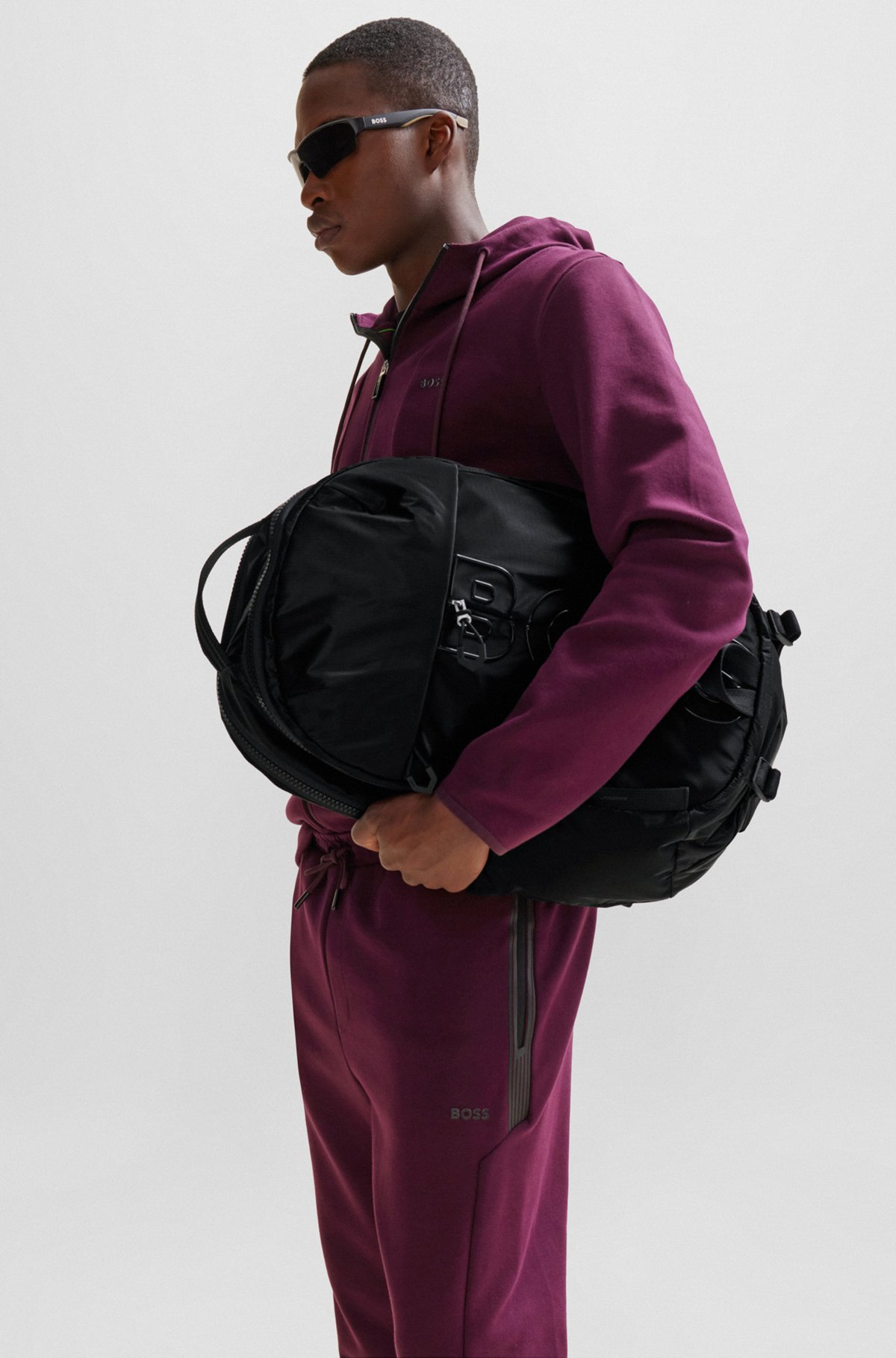 Coated-velour multi-pocket backpack with outline logo, Black