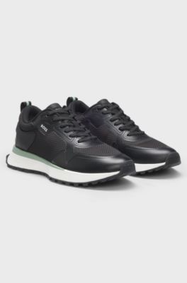 Mixed-material trainers with mesh details and branding, Black